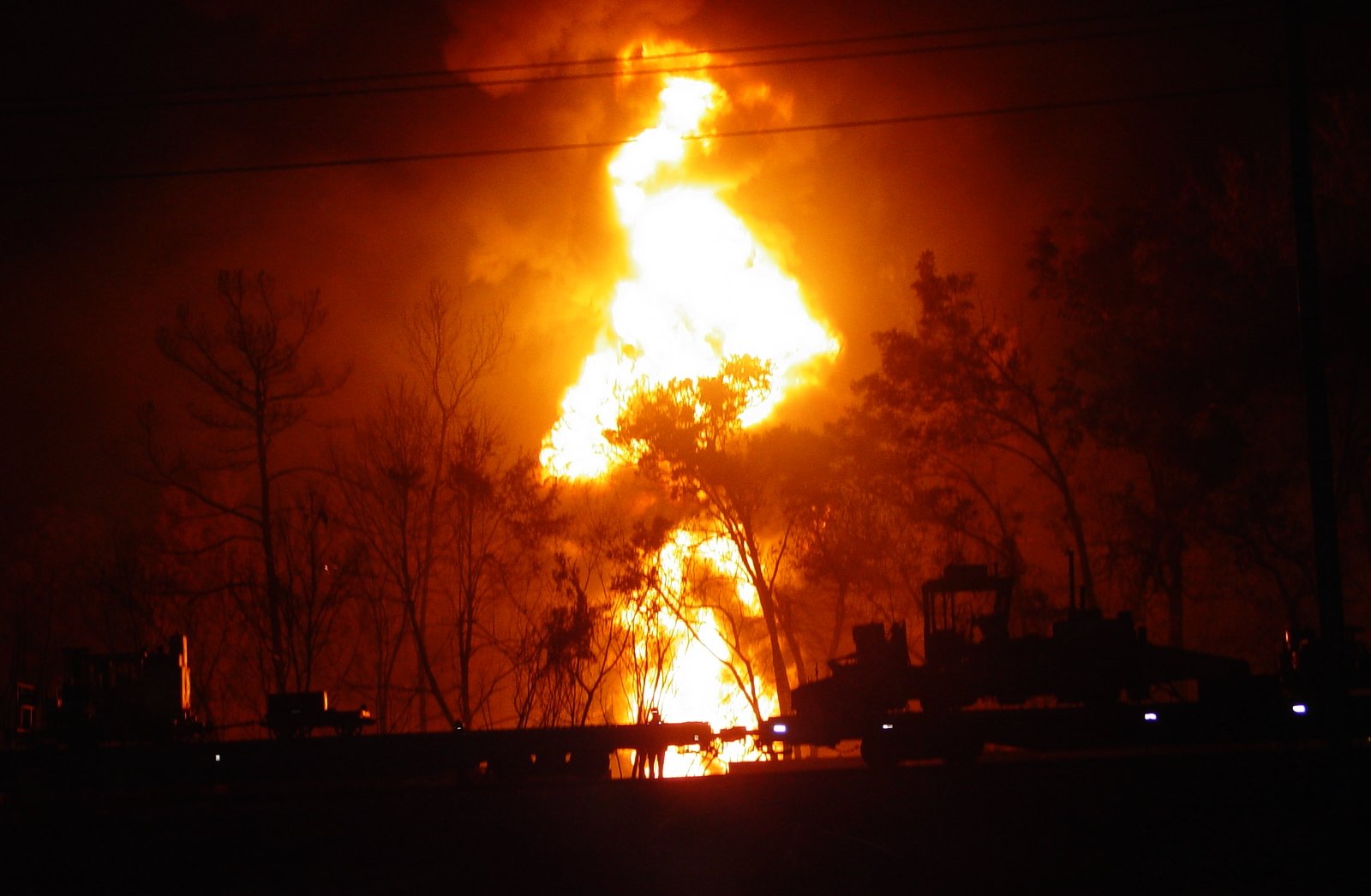 Large fire erupts throughout the night, as a result from the train derailment.